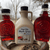 Three bottles of pure maple syrup. 