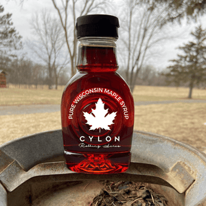 A bottle of pure Wisconsin maple syrup.